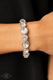 Still GLOWING Strong - White Bracelet - Paparazzi Accessories